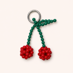 Red and green beaded cherries bag charm with silver key ring