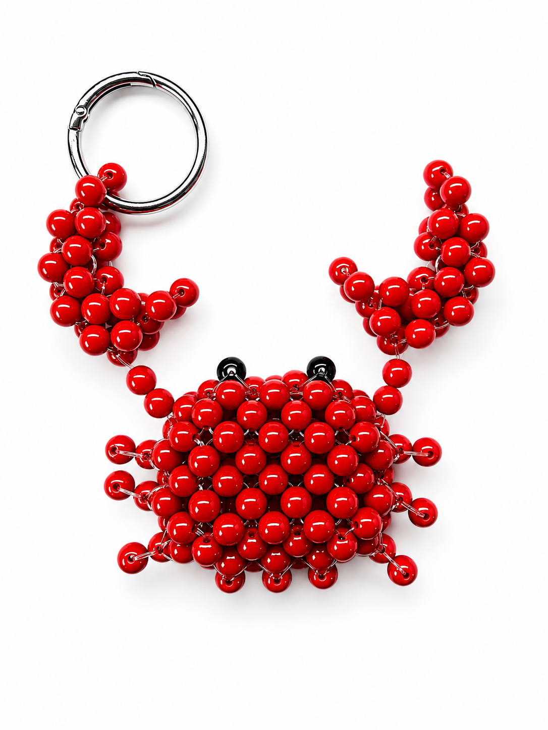 27D999BA-5B6C-4B84-BDFA-D883836B8F1D Red beaded crab charm laid flat with raised claws, black bead eyes and a silver-tone ring