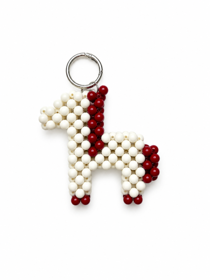 Ivory and cherry-red beaded horse bag charm with silver key ring