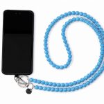 Blue handmade acrylic bead phone strap displayed with a phone