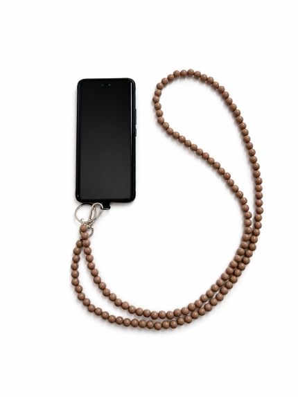 Brown handmade acrylic bead phone strap displayed with a phone
