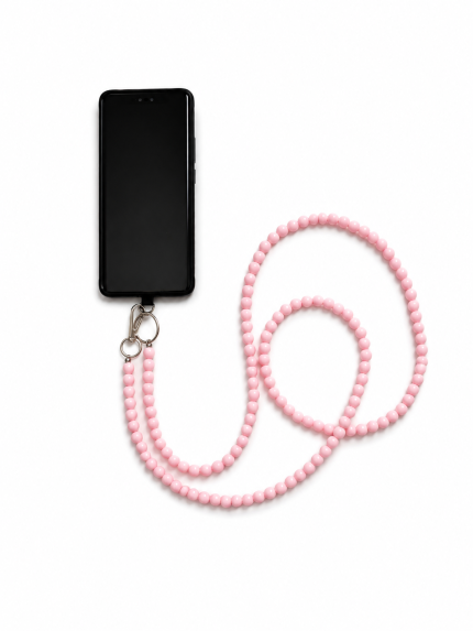 Pink handmade acrylic bead phone strap displayed with a phone